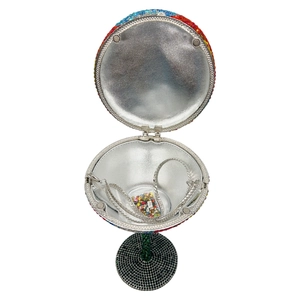 Inside view of a rainbow rhinestone cup clutch with silver chain and sphere closure