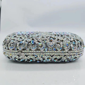 Elegant hollow metal evening clutch bag with sparkling Aurora Borealis crystals