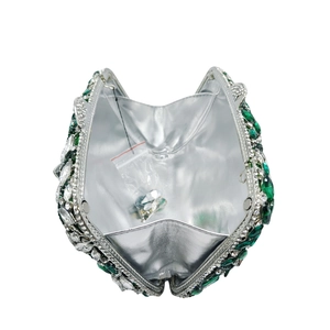 Elegant emerald crystal hollow out evening bag with silver metal frame and rhinestone inlay