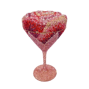 Detail of martini cup clutch bag with pink gradient rhinestones and metallic stem