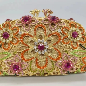 Luxury floral evening clutch bag with colorful rhinestones and gold metal flower pattern