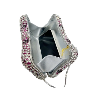 Silver flower crystal clutch bag with rhinestones shown open for smartphone capacity