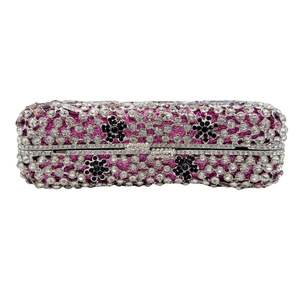 Close-up of sparkling floral crystal rhinestones on a rectangle evening clutch bag