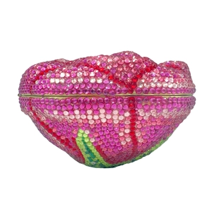 Detail of pink tulip flower evening bag with colorful crystals and gold metal frame