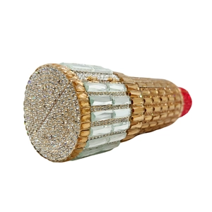 Lipstick-shaped crystal evening clutch bag with sparkling rhinestones and gold metal