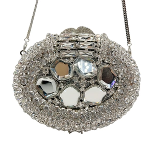 Silver hollow out metal evening clutch bag with sparkling rhinestones and crystal accents