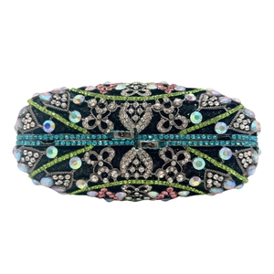 Luxury rhinestone evening clutch with hollow floral patterns and emerald gemstone accents