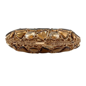 Luxury gold hollow evening clutch bag with amber faceted stones and sparkling rhinestones