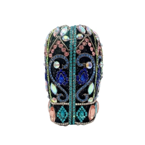 Macro detail of luxury evening clutch with colorful rhinestones on a metal frame