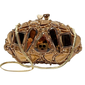 Hollow metal evening bag with amber stones and gold chain strap for parties
