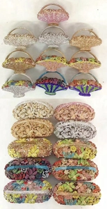 Selection of luxury rhinestone basket clutch bags in various colors for evening galas