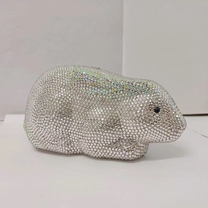 Sparkling rabbit-shaped evening clutch bag covered in silver and rainbow rhinestones