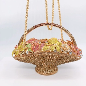 Detail of multi-color crystal flower basket clutch bag with champagne diamond accents