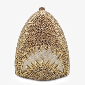 Exquisite close-up of champagne gold shark evening bag featuring dense rhinestone encrusting