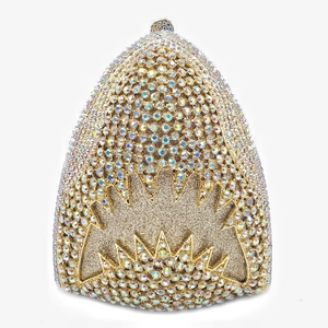 Macro shot of shark-shaped evening clutch bag featuring colorful sparkling rhinestones