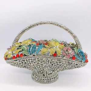 Detailed view of the basket-style evening clutch with multi-colored crystal floral patterns