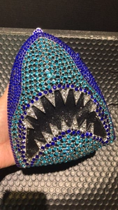 Detailed close-up of blue crystal shark evening clutch bag showing intricate rhinestone work