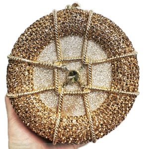 Elegant gold round evening clutch bag with champagne rhinestones for gala and dinner parties