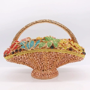 Macro view of crystal flower basket clutch bag with colorful rhinestones and gold frame