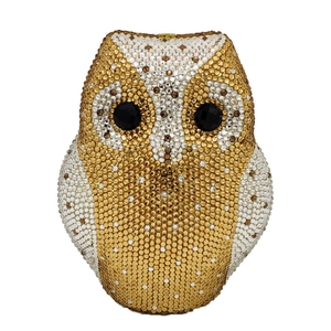 Detailed close-up of owl evening clutch bag with full crystal inlay and metal closure