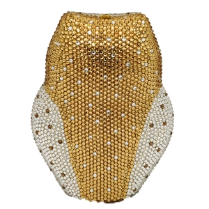 Detailed close-up of champagne gold rhinestones on the owl-shaped luxury dinner clutch bag