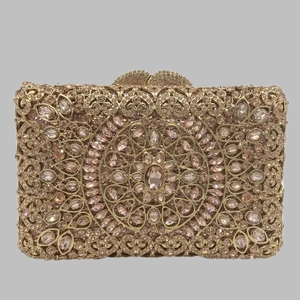 Luxurious champagne gold hollow-out metal clutch bag with rhinestones for evening parties