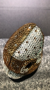 Detailed view of the luxury owl clutch showing intricate gold and brown rhinestone craftsmanship