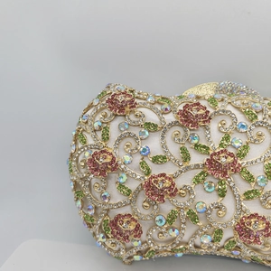 Luxurious gold hollow metal evening bag with colorful crystals and rose floral pattern
