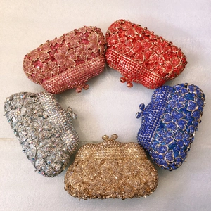 Top view of sparkling crystal clutch bags in five colors with heart petal patterns