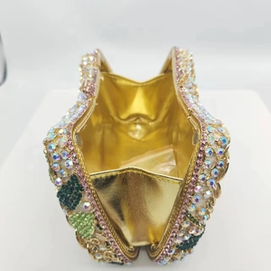 Star-shaped luxury evening clutch with colorful rhinestones and gold metal lining