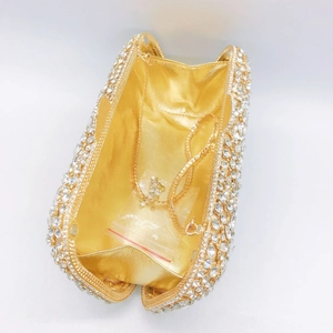 Internal view of the gold rhinestone evening clutch with chain strap and luxury lining