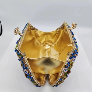 Luxurious evening clutch with colorful crystals and enamel flowers in golden finish