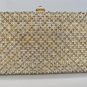Sparkling crystal evening clutch bag with gold and silver rhinestone grid pattern