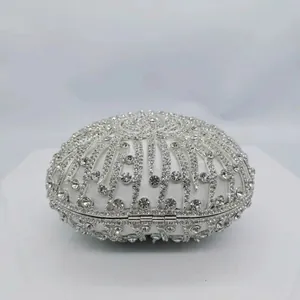 Elegant heart-shaped evening clutch bag with silver rhinestones and pearls for weddings