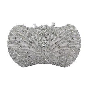 Elegant silver crystal evening clutch bag with hollow metal frame and shimmering rhinestones