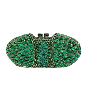 Pochette de soirée en métal évidé ornée de strass vert émeraude et motif floral