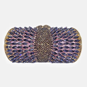Detail of lavender crystal evening clutch with golden frame and marquise rhinestones