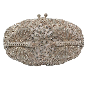 Luxurious butterfly-shaped silver crystal evening clutch bag with sparkling diamond details