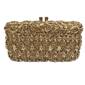 Luxury gold hollow filigree evening clutch bag with sparkling crystals and metal clasps
