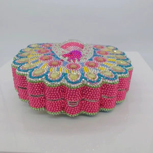 Peacock design evening clutch bag with colorful rhinestones in a mandala shape