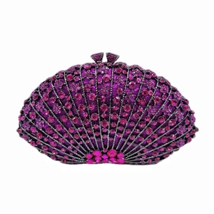 Luxurious purple shell-shaped evening bag with radiating rhinestones and metal clasp