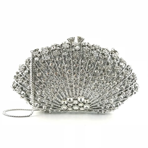 Silver fan-shaped evening clutch bag with sparkling rhinestones and metal chain strap