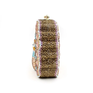 Detailed side view of peacock crystal evening clutch with wave-shaped rhinestone pattern
