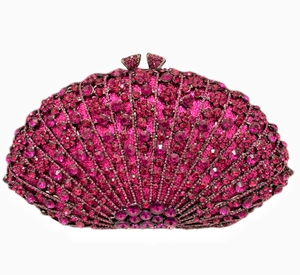 Close-up of sparkling rose pink rhinestone-encrusted fan-shaped evening clutch with metal clasp