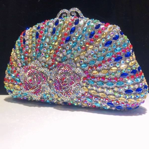 Macro detail of multicolored rose crystal evening clutch bag with intricate rhinestones