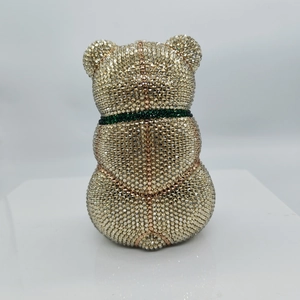 Luxury teddy bear clutch bag with sparkling gold crystals and green rhinestone necklace