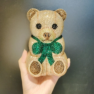 Sparkling bear-shaped evening clutch bag encrusted with champagne gold rhinestones