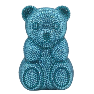 Detailed view of the luxury blue crystal teddy bear clutch bag for evening parties