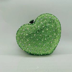 Sparkling green heart-shaped rhinestone evening clutch bag with black gem closure