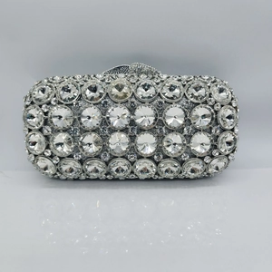 Detailed view of silver luxury evening clutch with full rhinestone crystal embellishment